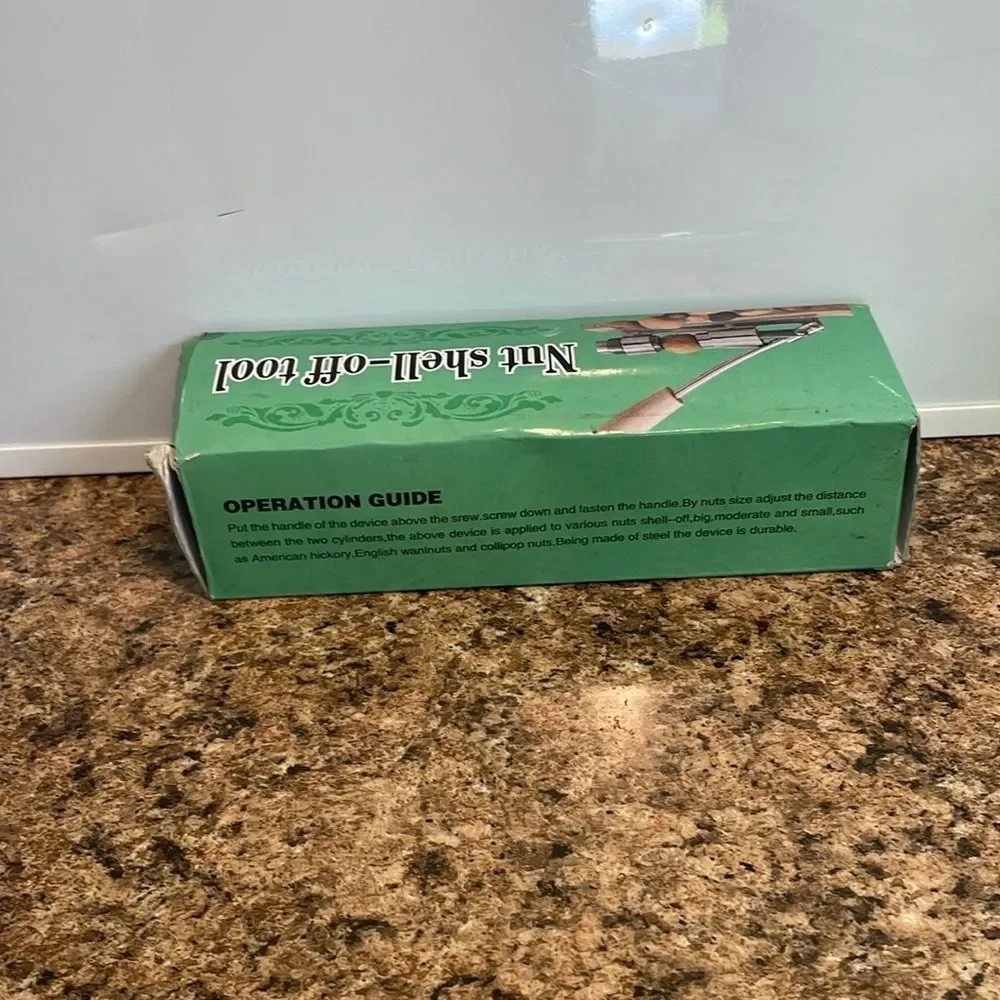 Nut‎ Shell-Off Tool in Green Box